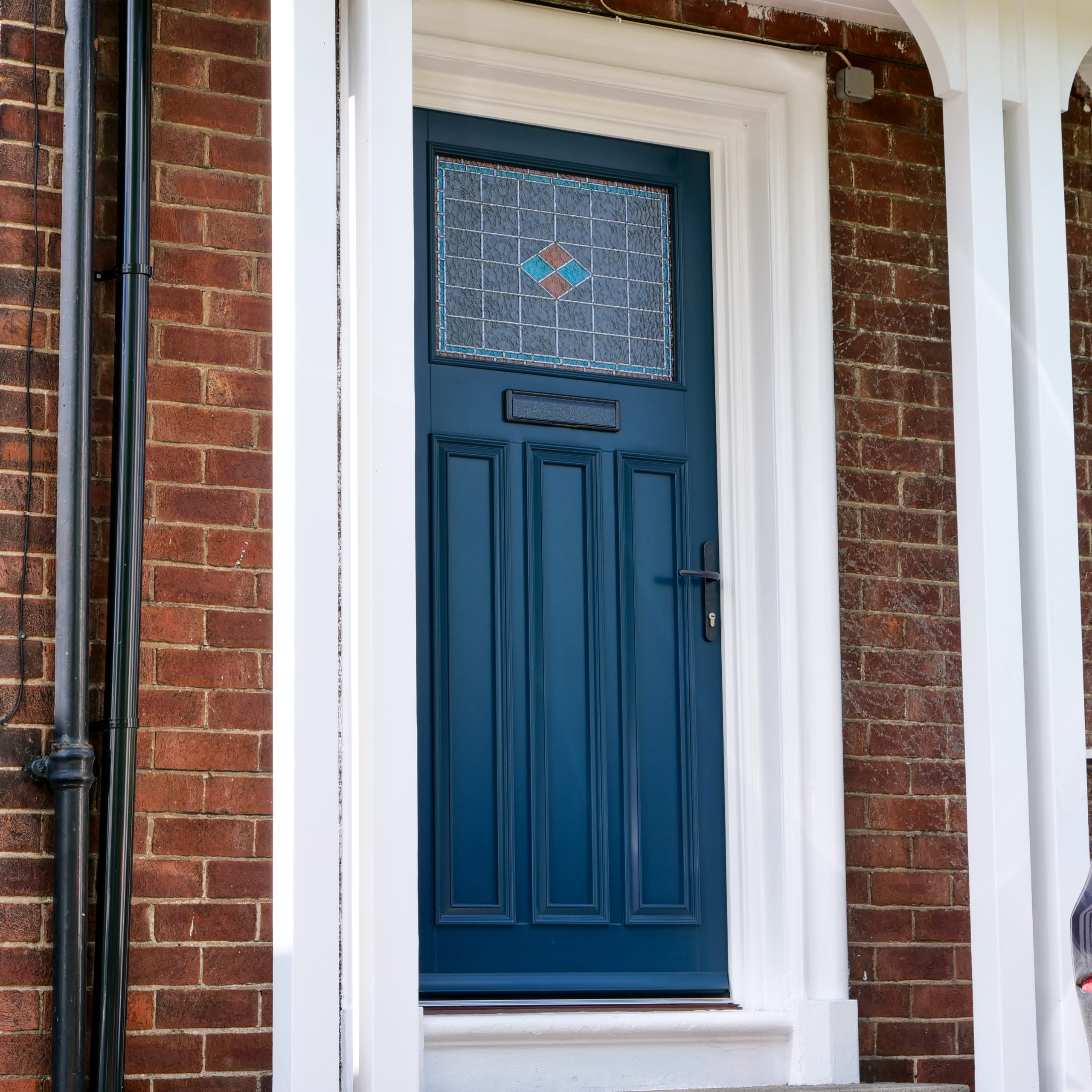blue Davenport door with lead detailing